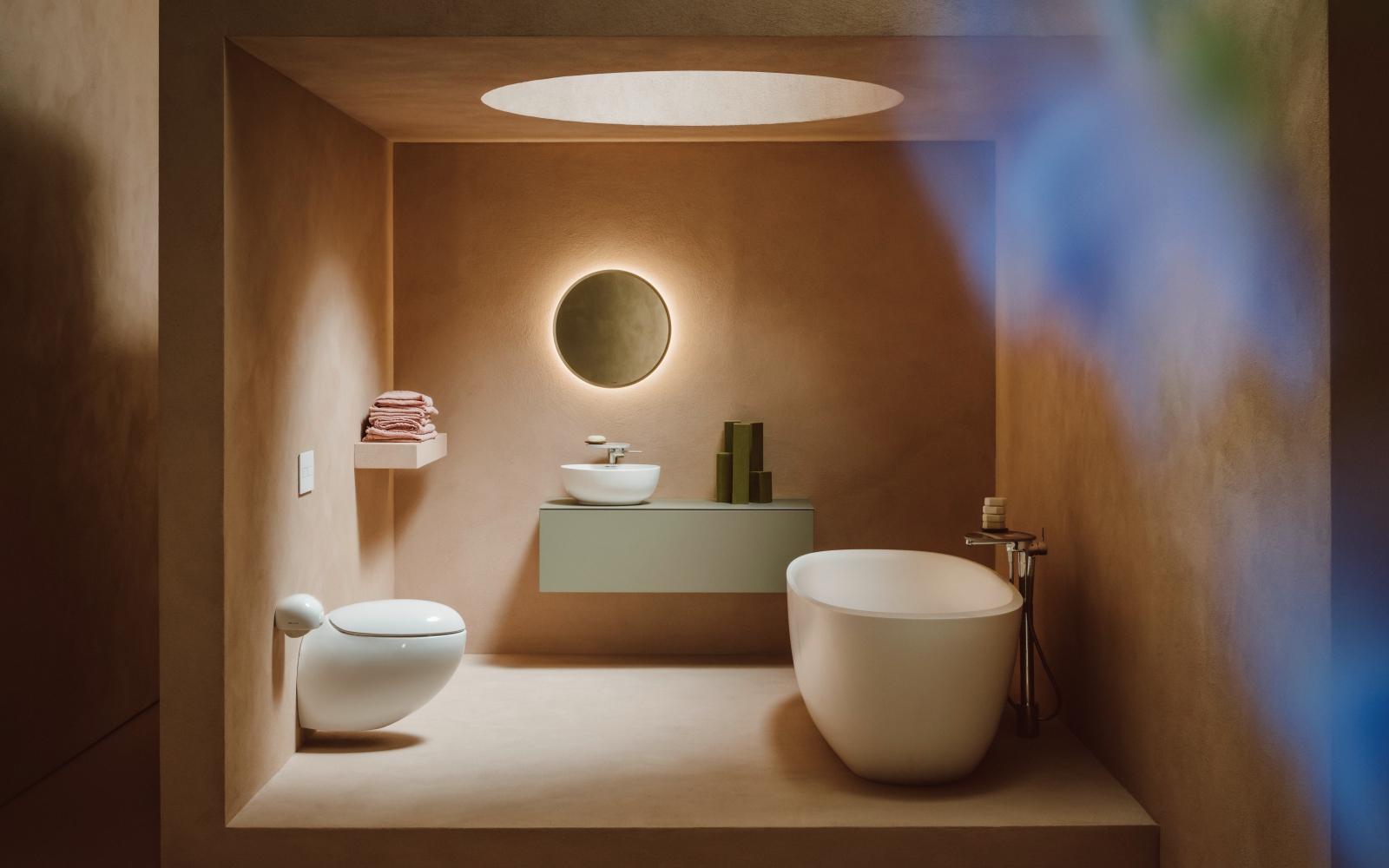 Laufen freestanding bathtub and wood vanity