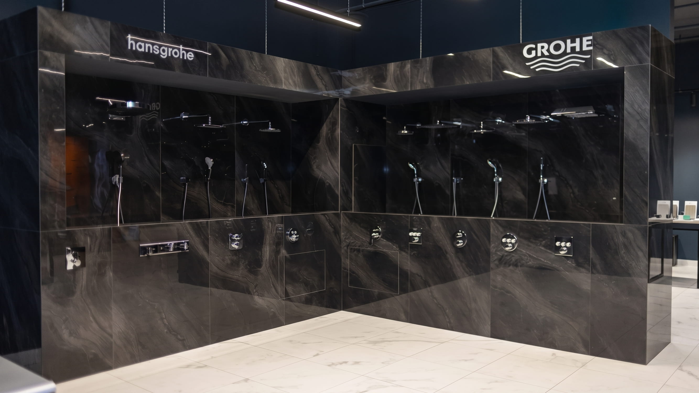 Specialized exhibition area with premium Hansgrohe and Grohe shower systems